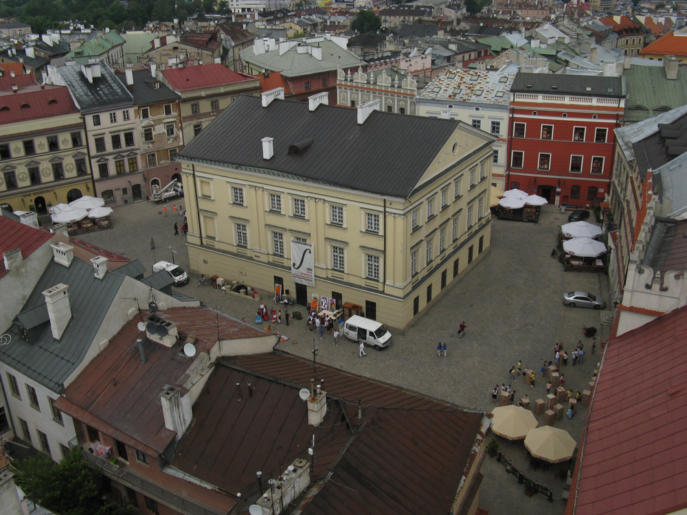 Photography of the Old Town Market Square with the Royal Tribunal building