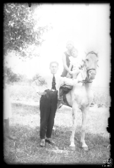 Man holding a horse