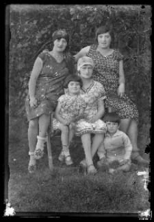 Three women with two children