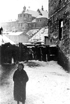 Krawiecka Street in Lublin and a church of the Dominican Order in the background