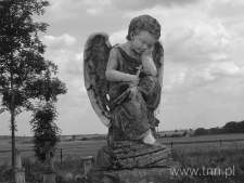 Fragment nagrobka - anioł