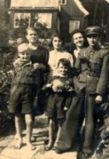 Lidia Hobbs (Damm) with the Trzeciak family, after the liberation.