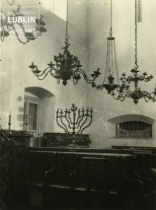 The inside of the Maharshal Synagogue in Lublin. The view on candlesticks and hanging candle holders.