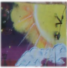 Słońce - jeden z symboli muralu