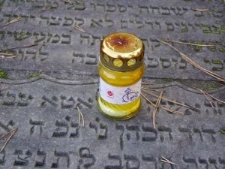 Candle at the Jewish cemetery on the anniversary of liquidation of the ghetto in Siemiatycze