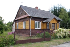 Dom drewniany przy ul. Armii Krajowej 13 lub 11 w Dubience