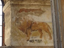 A polychromy depicting a lion on the wall of the synagogue in Rymanów