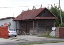 Drewniany spichlerz przy ul. Uchańskiej 95 w Wojsławicach