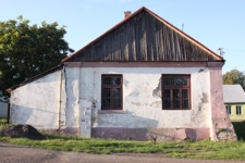 Ściana południowa budynku dawnej kasy oszczędnościowej przy Rynku w Wojsławicach