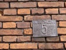 Stara tabliczka z nazwa ulicy Bużnicznej 5 w Kraśniku