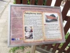 An information board in Knyszyn presenting a house from 18th century
