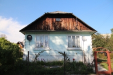 Szczytowa ściana domu drewnianego przy ulicy Zielonej 14 w Szczebrzeszynie