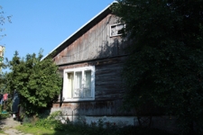 Ściana szczytowa domu drewnianego przy ulicy Zielonej 4 w Szczebrzeszynie