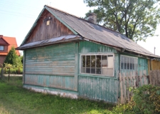 Ściana szczytowa domu drewnianego przy ulicy Kościuszki 42 w Krasnobrodzie