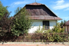 Ściana szczytowa domu drewnianego przy Placu Konfederacji 1(?) w Tyszowcach