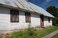 Dom drewniany przy Placu Konfederacji 1(?) w Tyszowcach