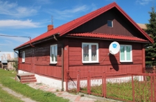 Ściana szczytowa domu drewnianego przy ulicy Wielkiej 37 w Tyszowcach