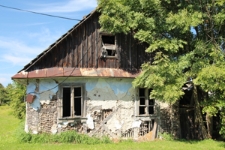 Ściana szczytowa domu drewnianego przy ulicy Średniej 35 w Tyszowcach