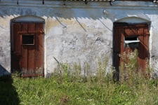 Elewacja przednia budynku gospodarczego przy skrzyżowaniu ulicy 3 Maja i Małej w Tyszowcach