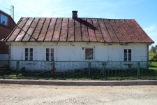 Elewacja frontowa domu drewnianego przy ulicy Małej 19 w Tyszowcach