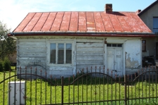 Elewacja frontowa domu drewnianego przy ulicy Małej 23 w Tyszowcach