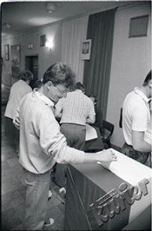 Casting the ballot at the voting booth in one of the municipal voting committees in Lublin