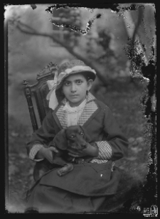 Portrait of a girl with a dog